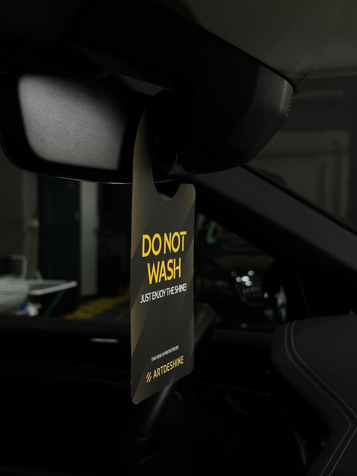Anhänger am Innenspiegel: Do not wash